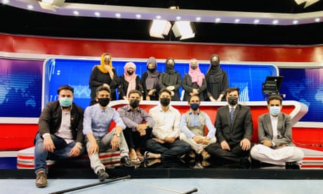 Male Afghan TV presenters mask up to support female colleagues after Taliban decree
