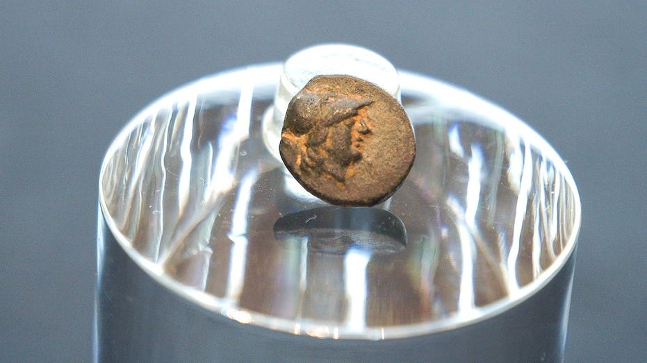 Teen stumbles on mysterious coin from legendary city, puzzling archaeologists over its journey Education WA